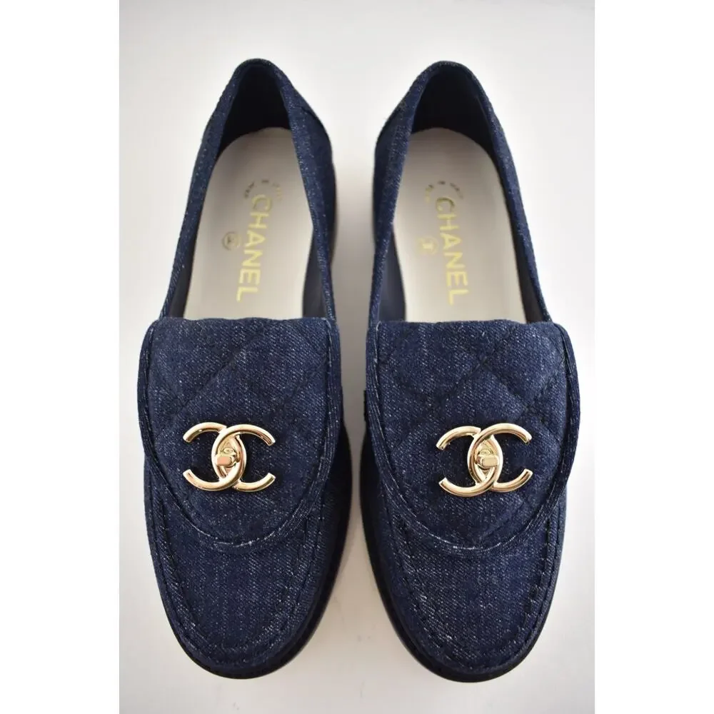 Chanel 24S Dark Blue Denim Quilted Turnlock CC Logo Moccasin Flat Loafer 38c
